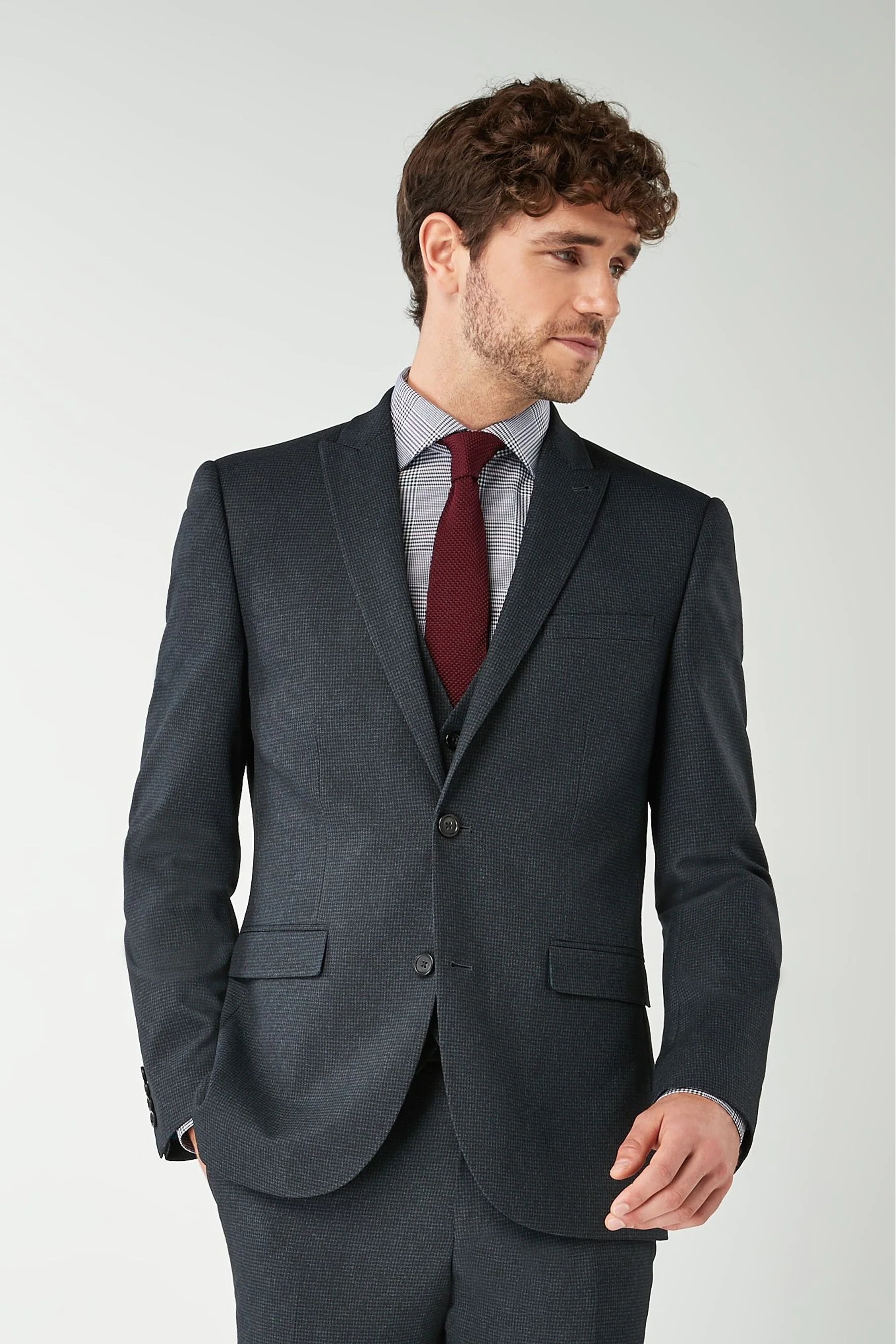 Traje de chaqueta tejido gris oscuro de un solo pecho con cuello en V para hombres de oficina de diseño personalizado
