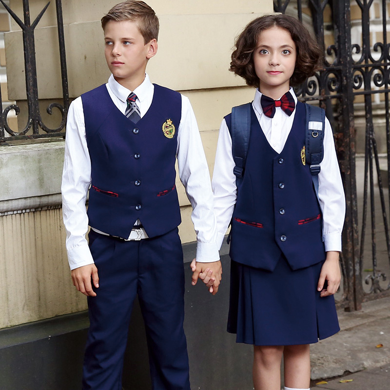 Los uniformes escolares de los diseños libres modificaron el delantal azul marino modificado para requisitos particulares de la escuela del muchacho y de las muchachas